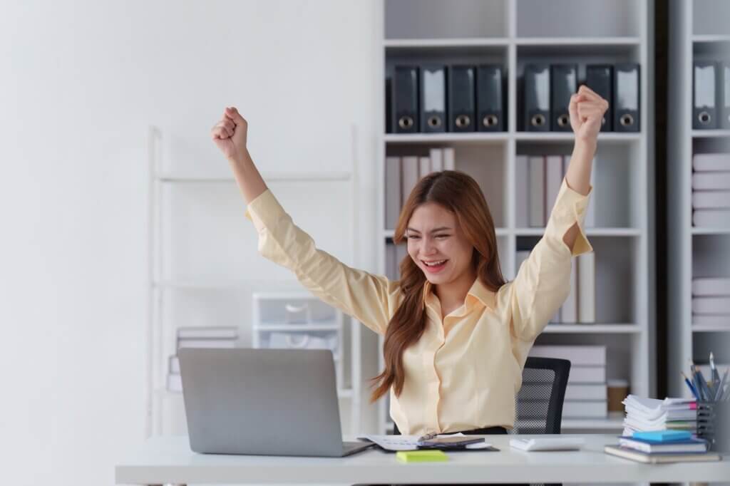 Financial advisor, corporate Accountant woman in office. analyzing benefits, enjoying financial